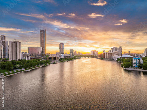 Yekaterinburg city with Buildings of Regional Government and Parliament, Dramatic Theatre, Iset Tower, Yeltsin Center, panoramic view at summer sunset. © Dmitrii Potashkin