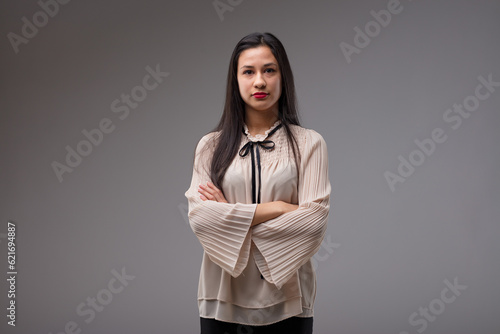 Εκτύπωση καμβά Proud Filipina boss with crossed arms, commanding