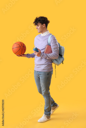 Male student with ball, sod...