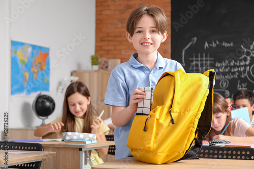 Little boy taking pencil ca...