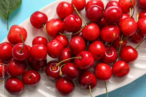 Plate with sweet cherries  closeup