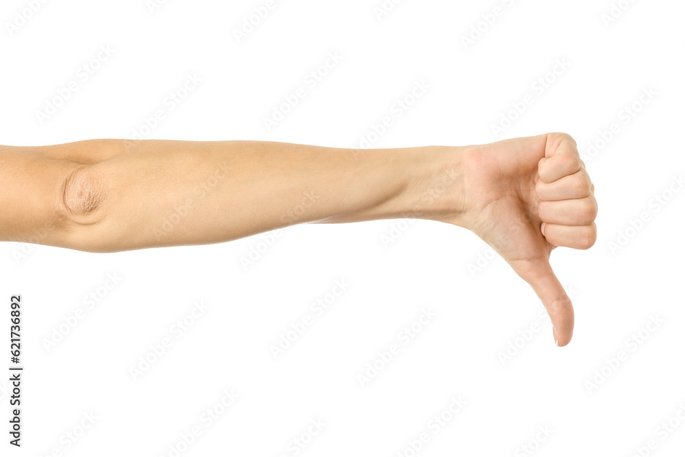 Thumb down. Woman hand gesturing isolated on white Thumb down. Woman hand gesturing isolated on white
