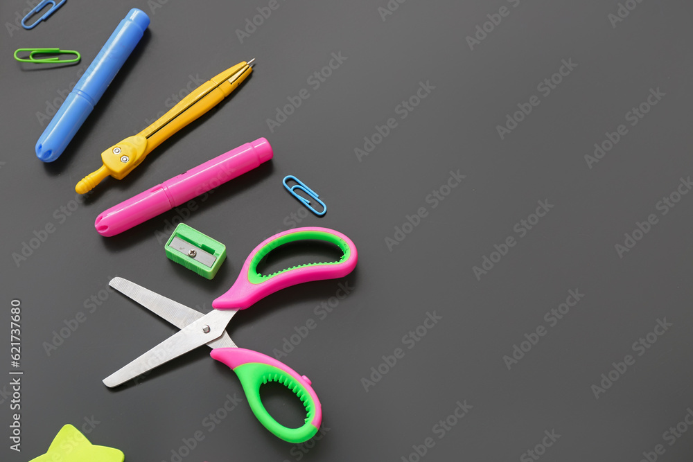 Different stationery on black chalkboard Different stationery on black chalkboard