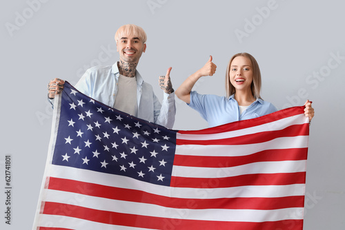 Young couple with USA flag ...