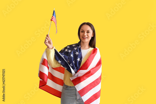 Happy young woman with USA ...