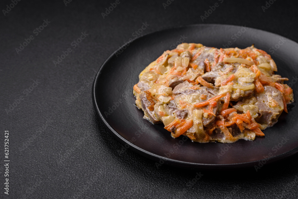 Delicious boiled beef or pork tongue sliced with carrots, onions, sour cream and spices