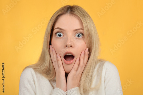 portrait of a surprised young blonde