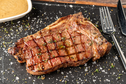 New York Strip Loin on stone cutting board at steak house