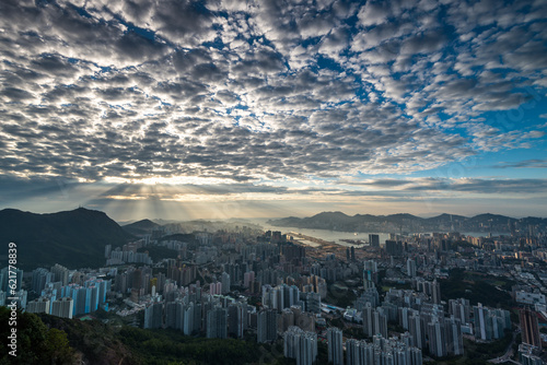 Aerial view of sun rise in Hong Kong with beautiful cloud and building