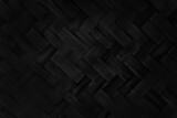 Old black bamboo weave texture background, pattern of woven rattan mat in vintage style.