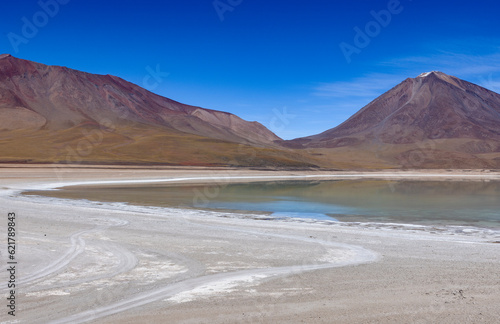 Picturesque Laguna Verde with Licancabur Volcano  just one natural sight while traveling the scenic lagoon route through the Bolivian Altiplano