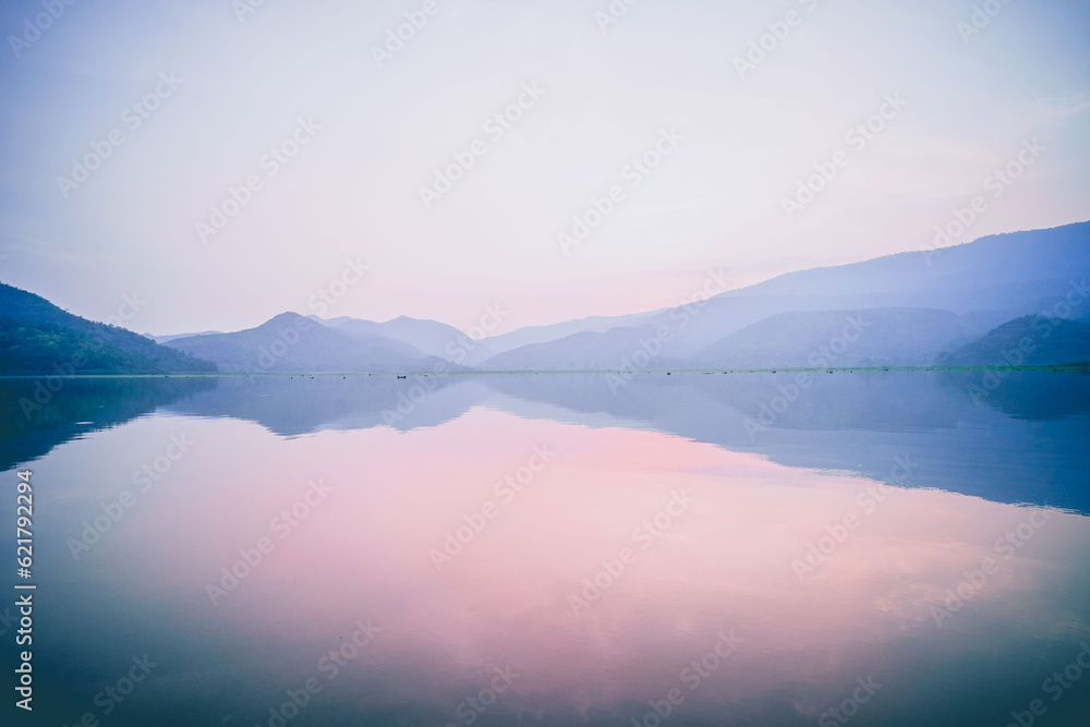 Serene Horizon: Minimal Landscape of Lake and Mountain under Pastel Pink Dusk Sky