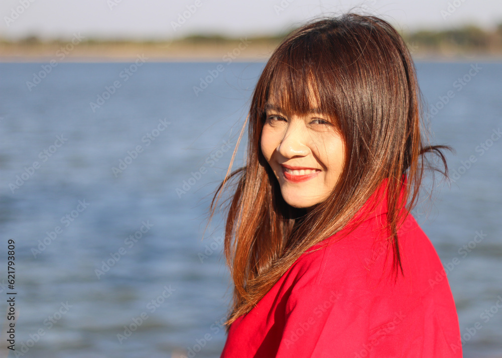 outdoor portrait of a beautiful asia woman at sea outdoor portrait of a beautiful asia woman at sea