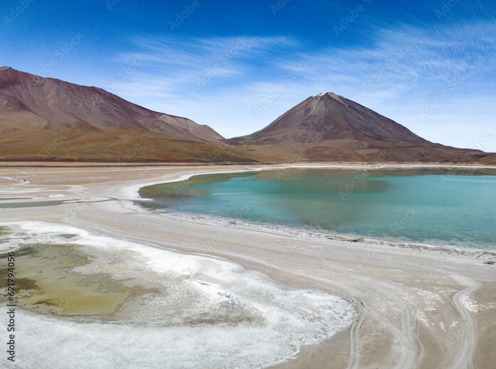 Aerial view of the picturesque Laguna Verde with Licancabur Volcano, just one natural sight while traveling the scenic lagoon route through the Bolivian Altiplano
