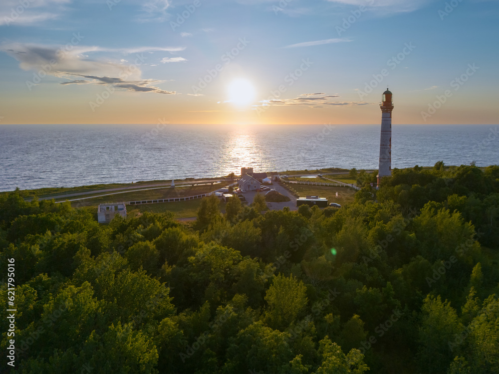Old lighthouse on the Paldiski peninsula at sunset in summer.