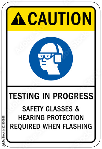 Testing in progress warning sign and labels testing in progress. Safety glasses and hearing protection required when flashing