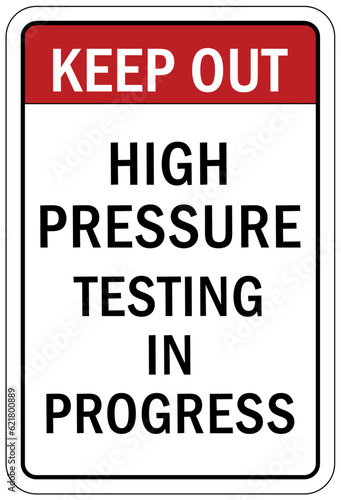Testing in progress warning sign and labels high pressure testing in progress