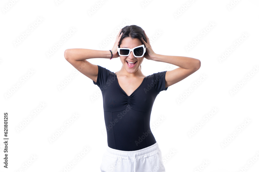 Obraz premium Studio portrait of young brunette model woman wearing funny fancy white sun glasses smiling