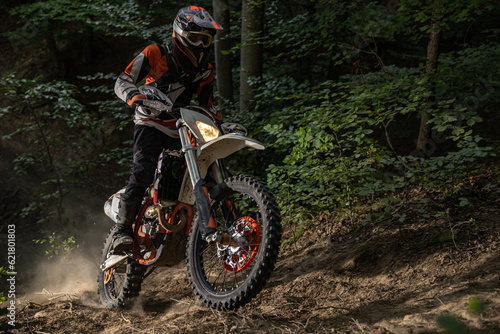 Motorcyclists trains in the forest