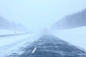 winter highway snowfall background fog poor visibility