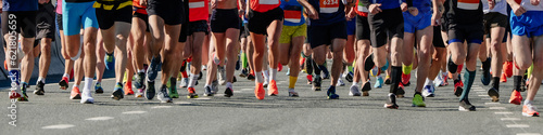 legs group of runners men and women run marathon race, panoramic view sports event © sports photos