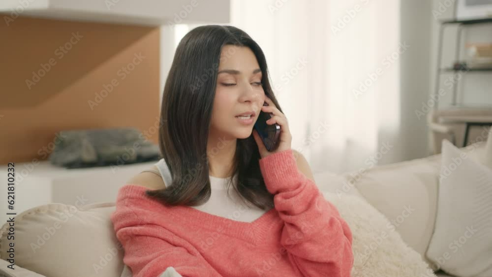 Happy female customer make mobile call confirming online website shopping order. Online delivery concept. Smiling young entrepreneur businesswoman talking on smartphone sitting in modern home office Happy female customer make mobile call confirming online website shopping order. Online delivery concept. Smiling young entrepreneur businesswoman talking on smartphone sitting in modern home office