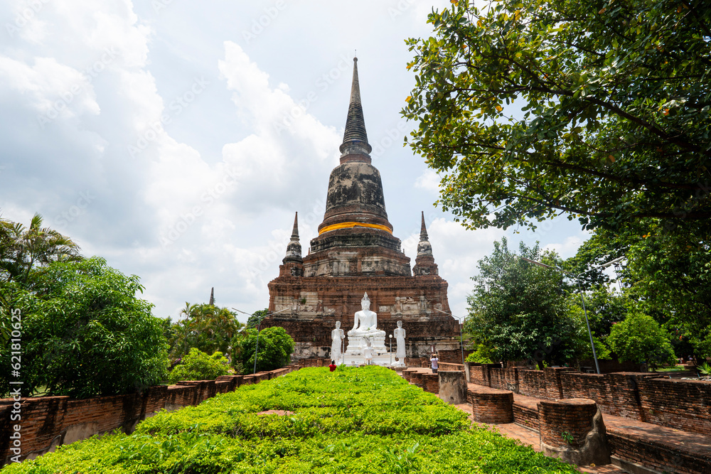 Fototapeta premium Monuments of buddha, Ancient temple Ayudhaya Wat Yai Chai Mongkol thailand. white buddha statue
