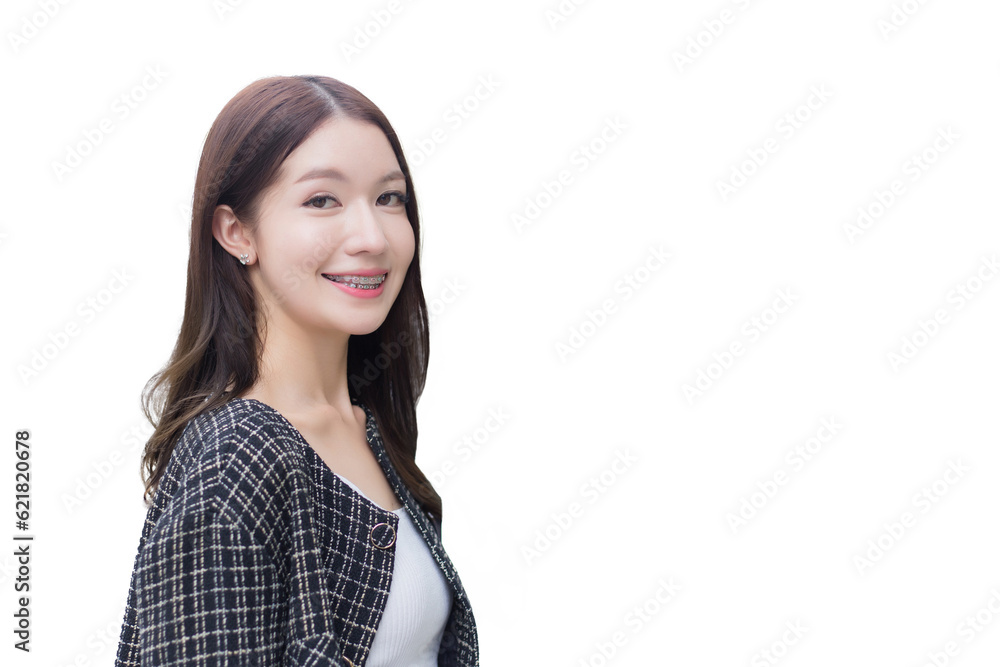 Portrait of beautiful long haired Asian woman in black pattern coat with braces on teeth walking and smiling while isolated on white background. Portrait of beautiful long haired Asian woman in black pattern coat with braces on teeth walking and smiling while isolated on white background.