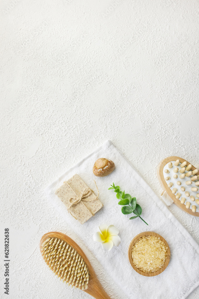 Cosmetic, massage and bath accessories set on white texture background Cosmetic, massage and bath accessories set on white texture background