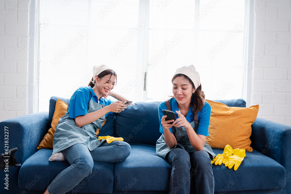 Housework or house keeping service two female cleaning dust in home, cleaning agency small business. professional equipment cleaning old home. Housework or house keeping service two female cleaning dust in home, cleaning agency small business. professional equipment cleaning old home.