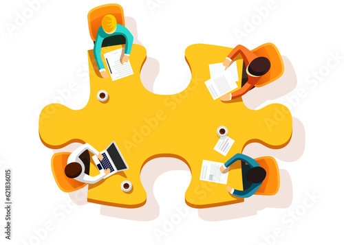 Group of businessman having a meeting around jigsaw puzzle table.