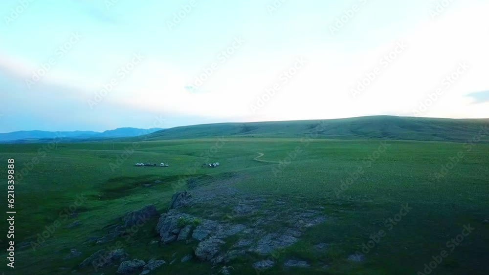 Aerial Shot Of People On Rocks At Green Mountain Against Sky, Drone Flying Over Landscape - Billings, Montana Aerial Shot Of People On Rocks At Green Mountain Against Sky, Drone Flying Over Landscape - Billings, Montana
