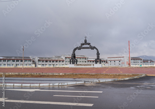 New empty buildings waiting a wave of Han chinese migrants, Qinghai province, Sogzong, China photo