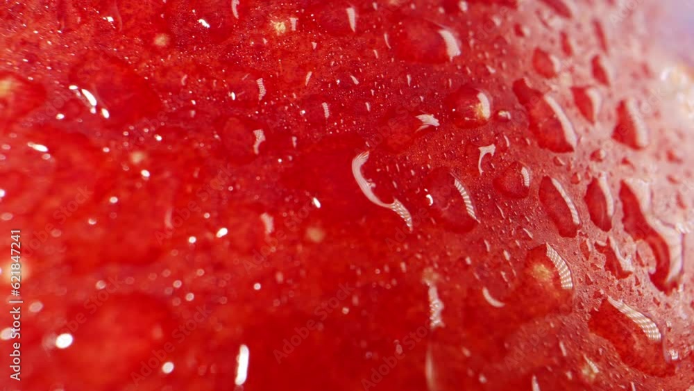 A mesmerizing macro video showcases a Jazz apple glistening with droplets of water. The vivid colors and intricate details come to life through the lens, revealing the refreshing beauty of nature
A mesmerizing macro video showcases a Jazz apple glistening with droplets of water. The vivid colors and intricate details come to life through the lens, revealing the refreshing beauty of nature