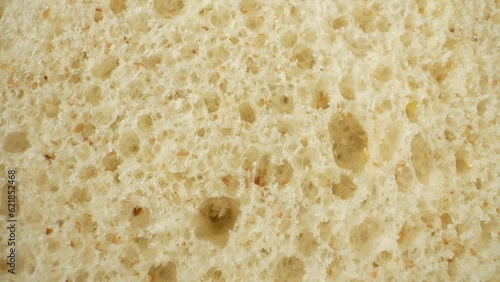 Wallpaper Mural Indulge your senses with a captivating macro video featuring soft whole wheat bread. Get up close and personal with every grain, capturing the essence of its wholesome goodness. Bread background
 Torontodigital.ca