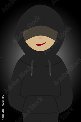 A suspicious person who hides his face with a black hoodie and has a fearless smile. photo