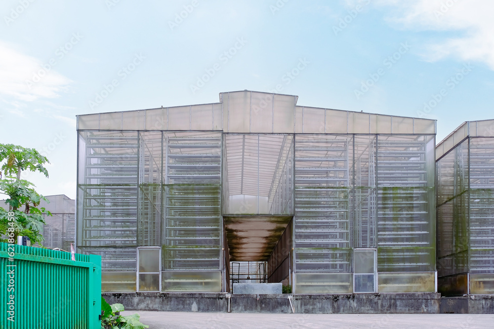Exterior view of a commercial vertical farm in Singapore. To maximise land for food production, vegetables are grown in A-shaped towers. Green technologies Exterior view of a commercial vertical farm in Singapore. To maximise land for food production, vegetables are grown in A-shaped towers. Green technologies