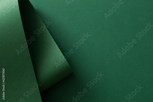 Colored paper, curved green 3d abstract background