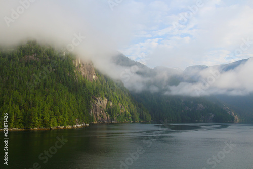 Misty Fjords National Monument rises out of the fog, Alaska, United States 