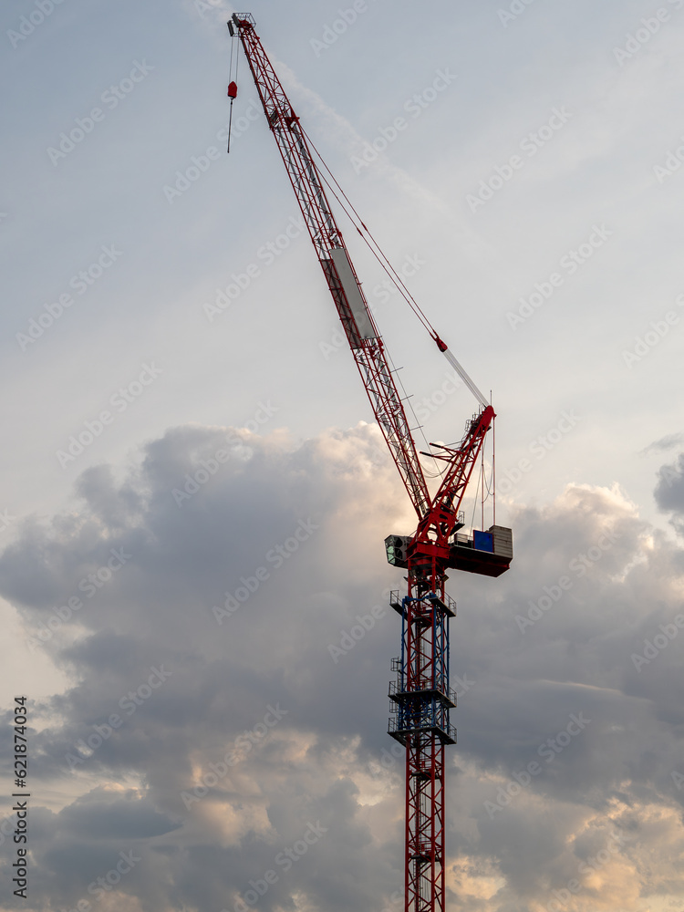 Construction tower crane against the sky. Tower crane close-up. Construction tower crane against the sky. Tower crane close-up.