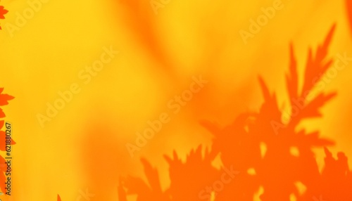 orange wall background texture with beautiful sunlight leaf shadow