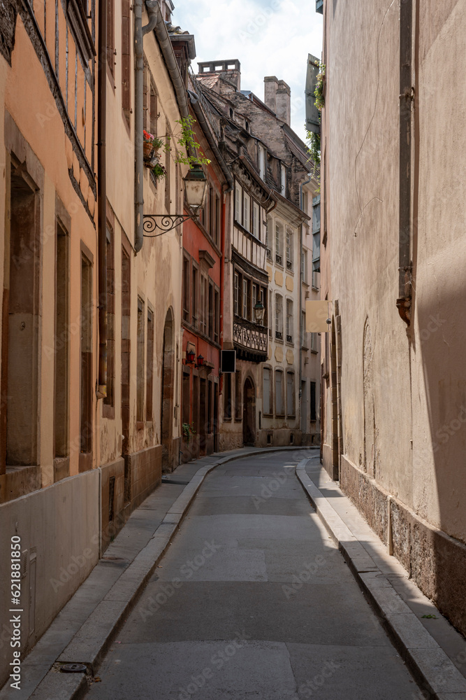 Obraz premium Strasbourg, France - 05 19 2023: View of typical street near the cathedral.