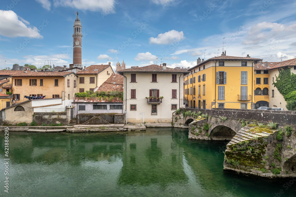 Palazzolo sull'Oglio, Italy - cityscape with old stone bridge over Oglio river