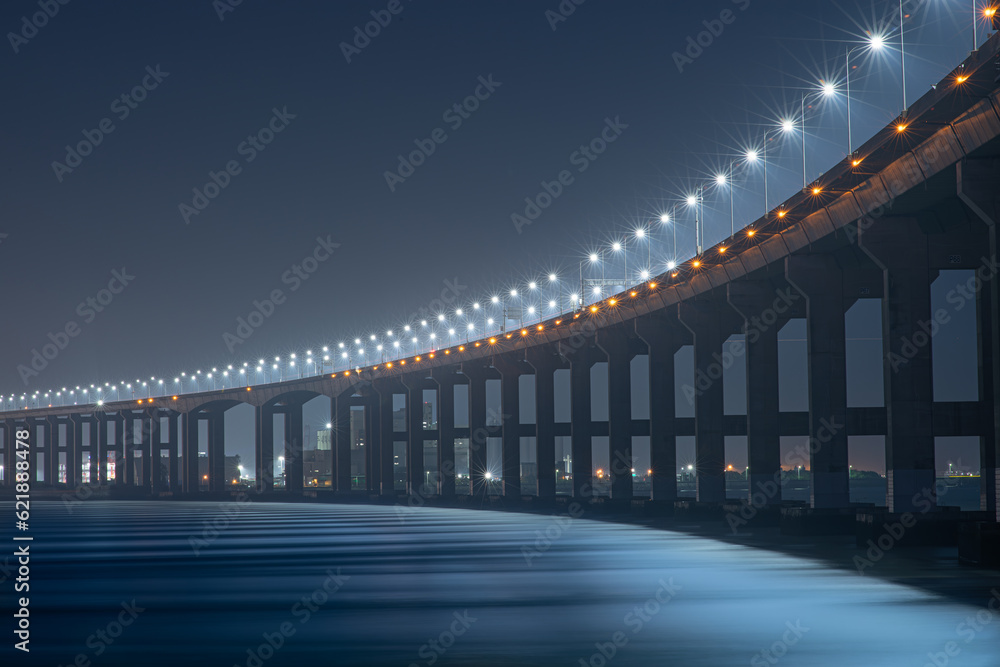 bridge and street lights over the sea
