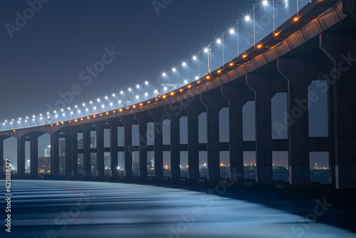 Fototapeta Naklejka Na Ścianę i Meble -  bridge and street lights over the sea
