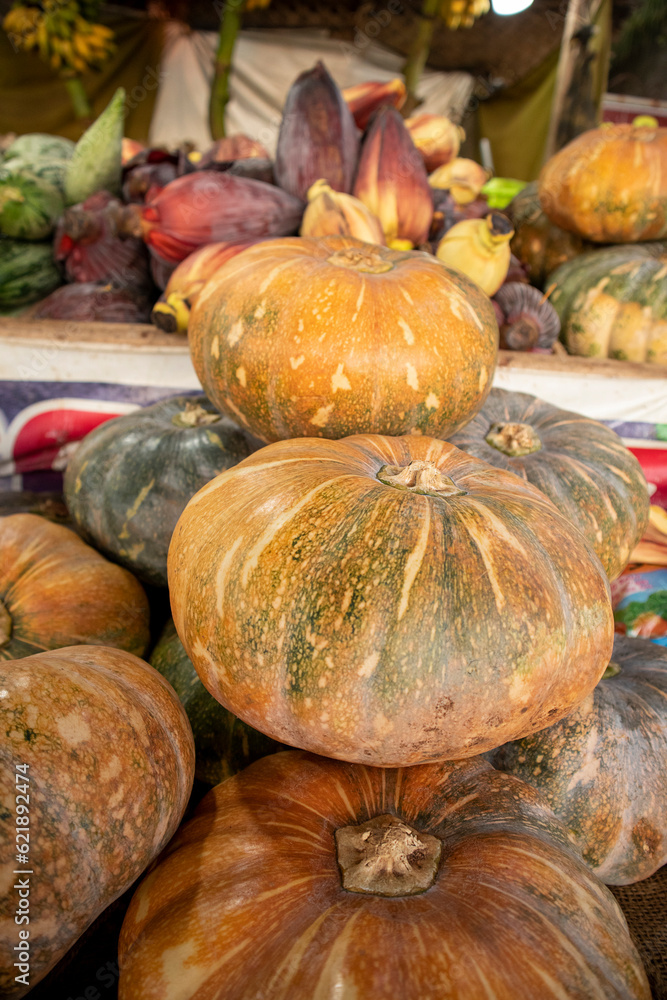 Close up of pumpkins on display at a local farmers market.