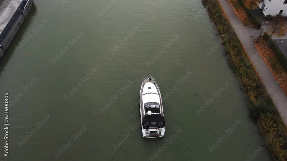 motor boat floats on the river, city, embankment motor boat floats on the river, city, embankment