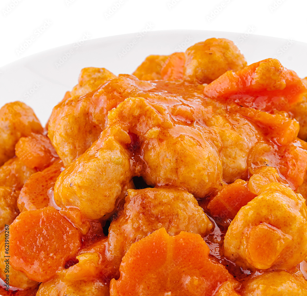 tiftels in carrot sauce in a bowl tiftels in carrot sauce in a bowl