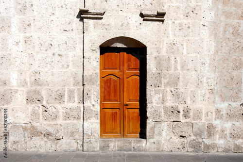 White walls and doors of the old streets of the city of Arequipa in Peru. photo