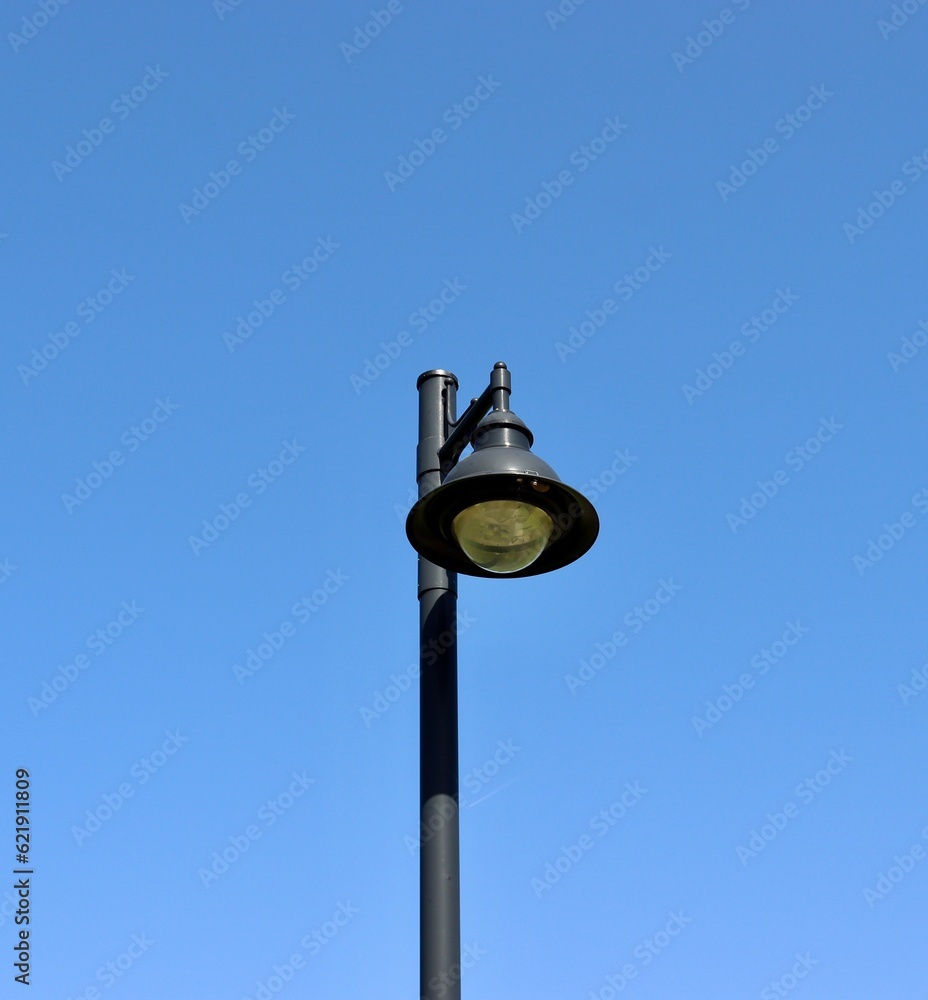 The black streetlight with a blue sky background. The black streetlight with a blue sky background.